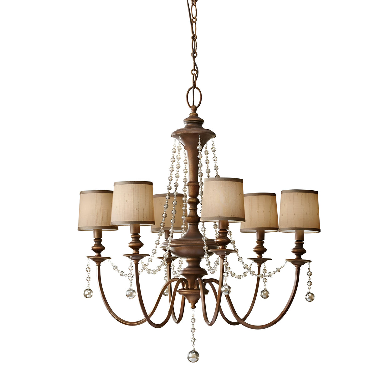 The Feiss Clarissa 6 Light Chandelier in Firenze Gold boasts an elegant and vintage appearance, featuring six beige fabric lampshades adorned with champagne-plated glass beads. It hangs from a chain, enhancing its classic charm.