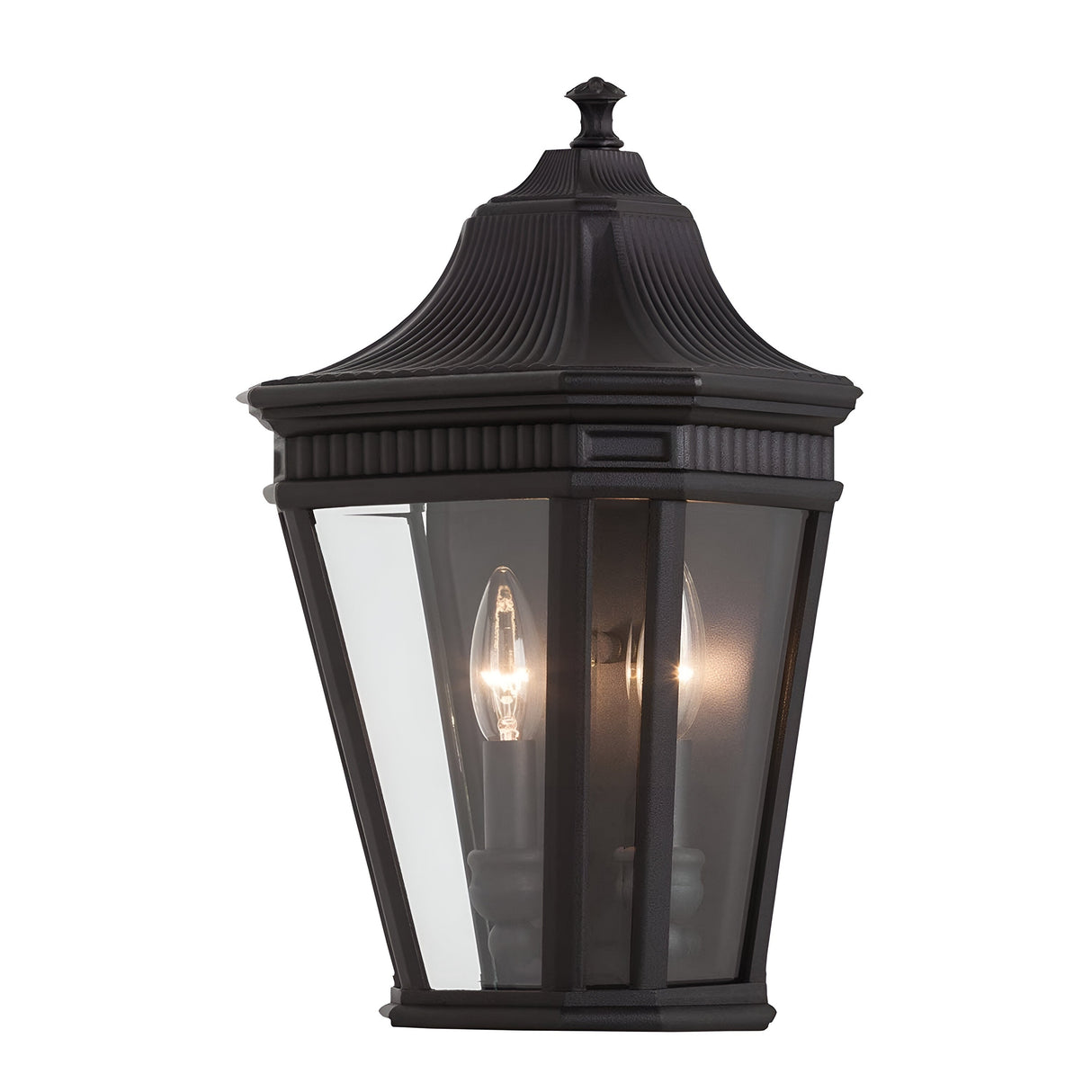 The Cotswold Lane 2 Light Outdoor Wall Lantern in black features a tapered rectangular design with clear beveled glass panels, highlighting two candle-like bulbs.