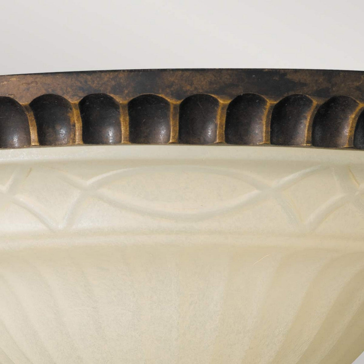 Close-up of a Drawing-1 Room 2 light flush with a frosted glass dome and a decorative walnut rim featuring Edwardian design patterns of carved shapes.