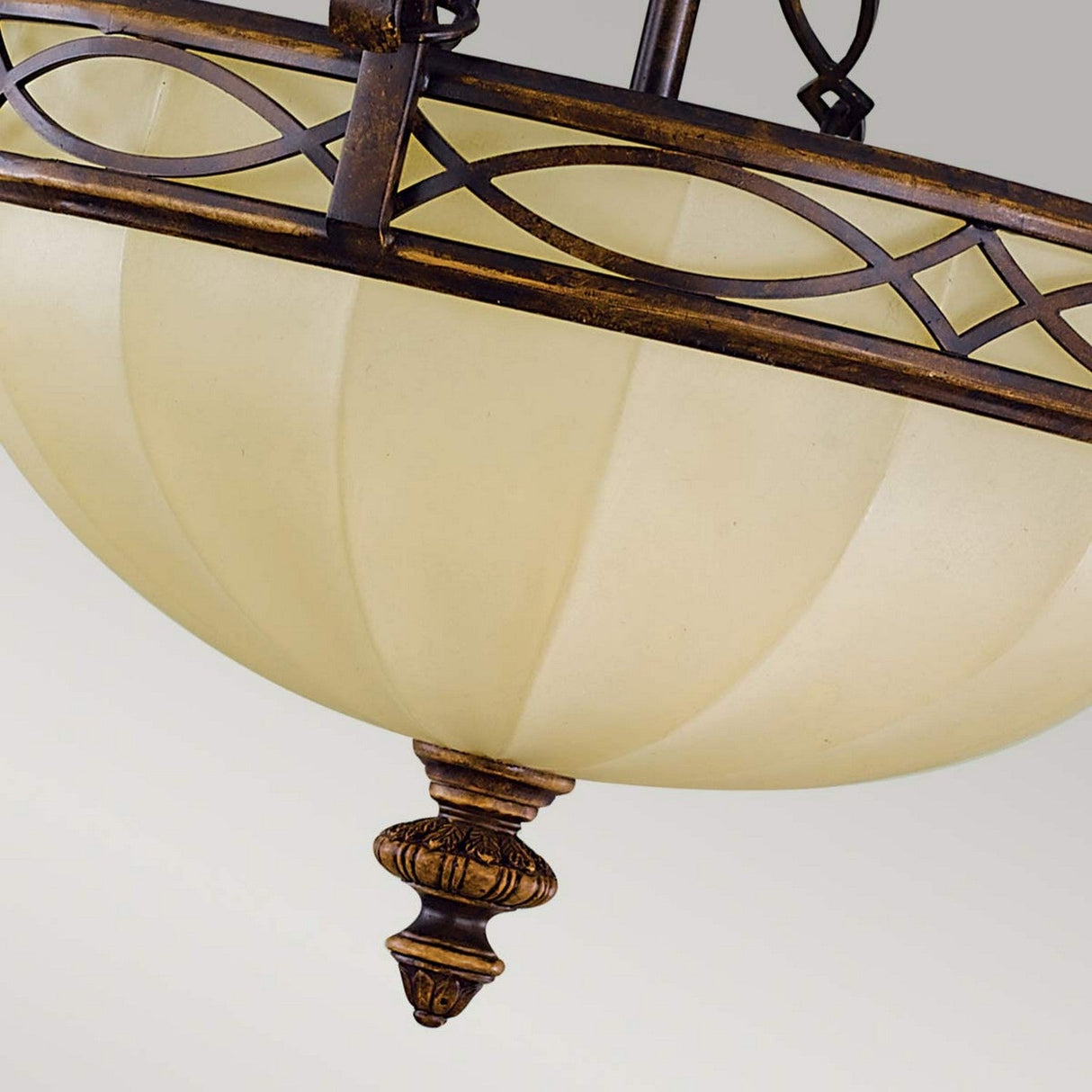 Close-up of the Drawing-3 Room 2 Light Semi Flush in Walnut, featuring an ornate design with a frosted glass dome and bronze detailing. This fixture embodies Edwardian elegance with intricate metalwork along the rim and a decorative finial at the base.