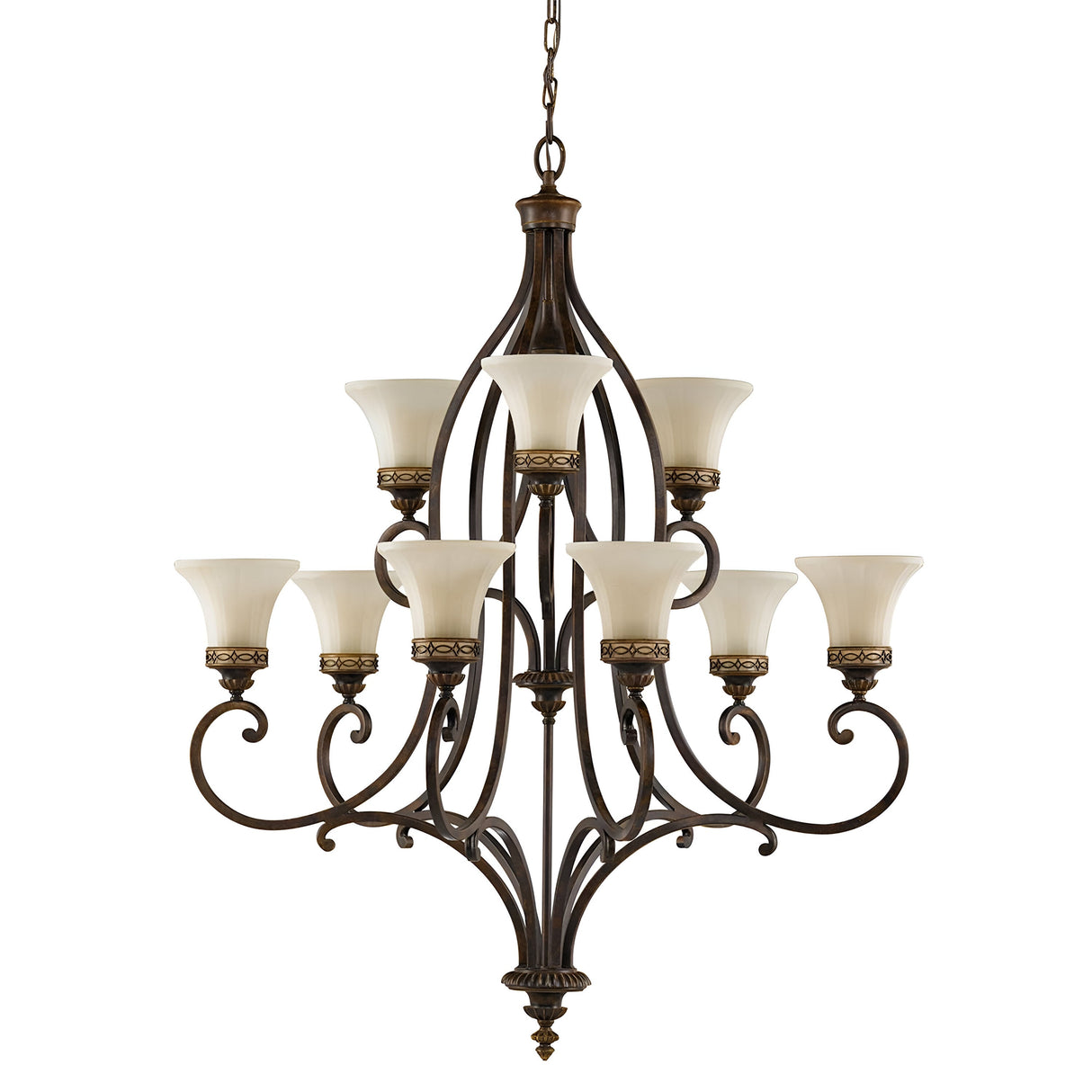 Introducing the Drawing Room 9 Light Chandelier - Walnut: This grand chandelier boasts nine cream-colored glass shades elegantly positioned in two tiers. Its metal frame is finished in a dark bronze with intricate gold details, adorned with elegant scrollwork that reflects Edwardian charm. The fixture hangs beautifully from a decorative chain.