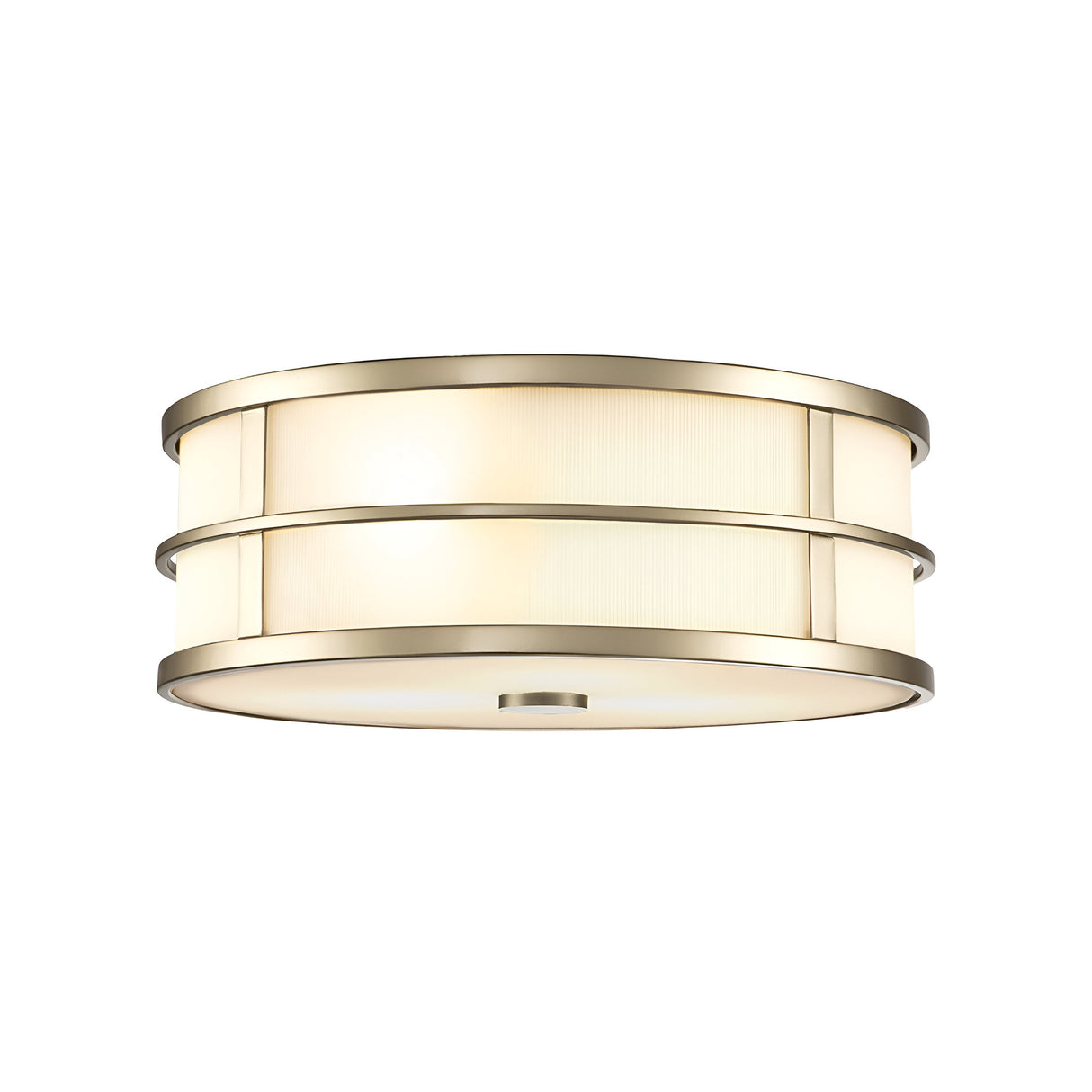 The Fusion 3 Light Flush in Painted Natural Brass is a contemporary ceiling light fixture with a round, drum-shaped design. It boasts ribbed glass shades and soft white panels that enhance its elegant appearance, adding warmth to any room.
