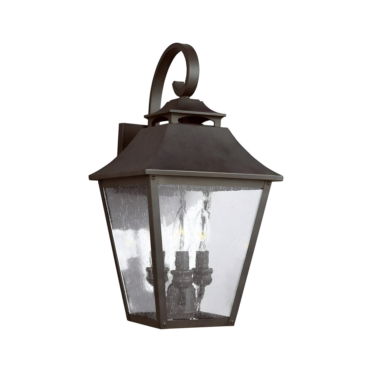 Introducing the Galena 3 Light Outdoor Large Wall Lantern - Grey: This exquisite piece offers a vintage-style design with a dark metal finish and clear glass panels. It features a unique rectangular shape, complete with a curved top and an elegant decorative scroll mounting bracket. Within, three candle-like light bulbs add a sophisticated touch to your outdoor decor.