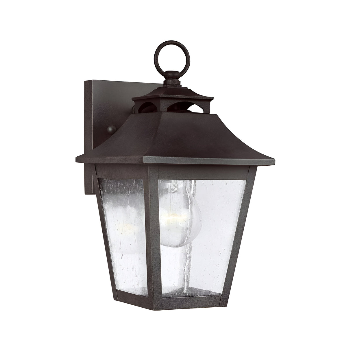 The Galena 1 Light Outdoor Small Wall Lantern, with its IP44 rating, features a grey metal frame and a classic design. Clear glass panels highlight the bulb inside, and the top ring detail enhances its style.