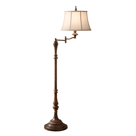 The Gibson 1 Light Floor Lamp - Dark Brown is a classic piece with a round base and adjustable arm, finished in dark brown. It is complemented by an ivory desert linen fabric shade, providing a traditional touch to the design.