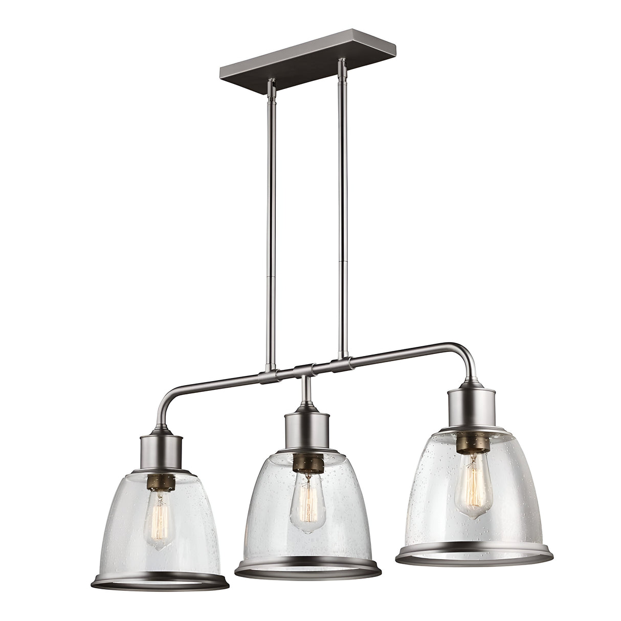 The Hobson 3 Light Island Light in Satin Nickel features a contemporary design with three pendant lights, each boasting seeded glass shades and satin nickel accents. The lights are suspended from a rectangular ceiling mount using two parallel rods, with exposed bulbs enhancing its modern and industrial appeal.