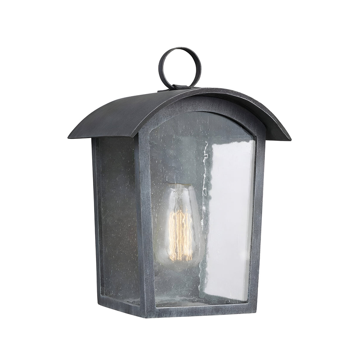 The Hodges Outdoor Small Wall Lantern in Ash Black, showcasing a curved top and glass enclosure, contains a visible filament bulb. Combining classic elegance with prairie design elements, it is ideal for outdoor lighting.