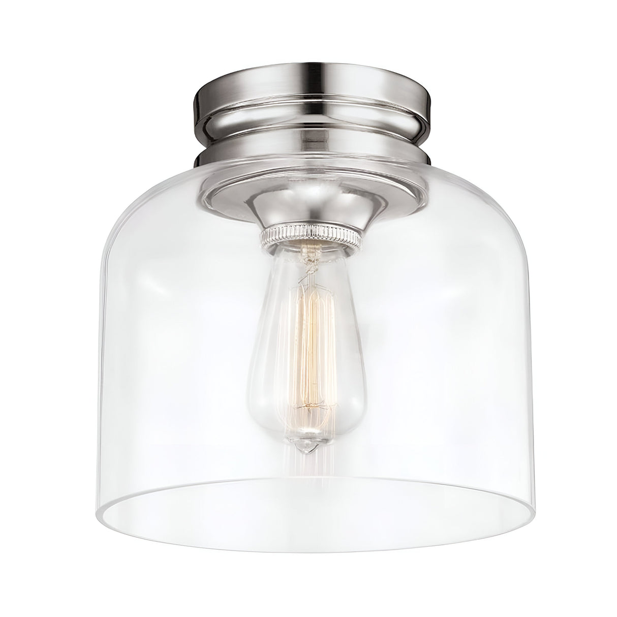 The Hounslow 1 Light Flush - Polished Nickel is a contemporary ceiling light fixture that features a clear glass shade and a single exposed filament bulb within a cylindrical metal mount. Its minimalist design, with a flush fitting, is elegantly complemented by the polished nickel finish.