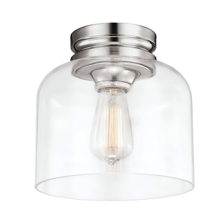 The Hounslow 1 Light Flush - Polished Nickel is a contemporary ceiling light fixture that features a clear glass shade and a single exposed filament bulb within a cylindrical metal mount. Its minimalist design, with a flush fitting, is elegantly complemented by the polished nickel finish.