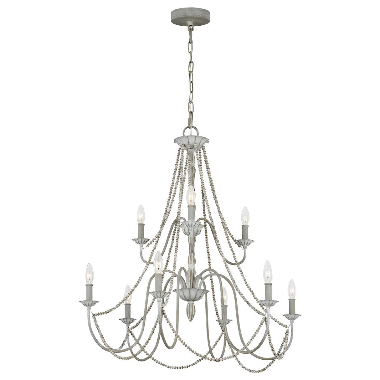 The Maryville 9 Light Chandelier - Washed Grey embodies French Country elegance with its two-tiered, nine candle-style lights. Its design includes graceful cascading chains and an intricately detailed metal frame, adding a touch of rustic charm to any room while being stylishly suspended by a chain from a circular ceiling mount.