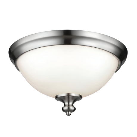 The Parkman 2 Light Flush - Brushed Steel features a frosted glass dome shade and a small decorative finial at the bottom, making it perfect for modern interiors.