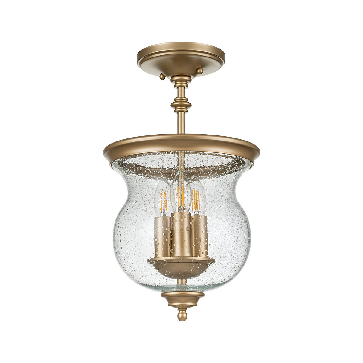 Introducing the Pickering Lane 3 Light Semi Flush - Brass: a timeless ceiling fixture featuring a charming seeded glass shade and three vintage-style exposed bulbs. It showcases a decorative round base that exudes vintage charm, enhancing its elegant design.
