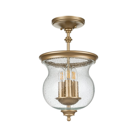 Introducing the Pickering Lane 3 Light Semi Flush - Brass: a timeless ceiling fixture featuring a charming seeded glass shade and three vintage-style exposed bulbs. It showcases a decorative round base that exudes vintage charm, enhancing its elegant design.