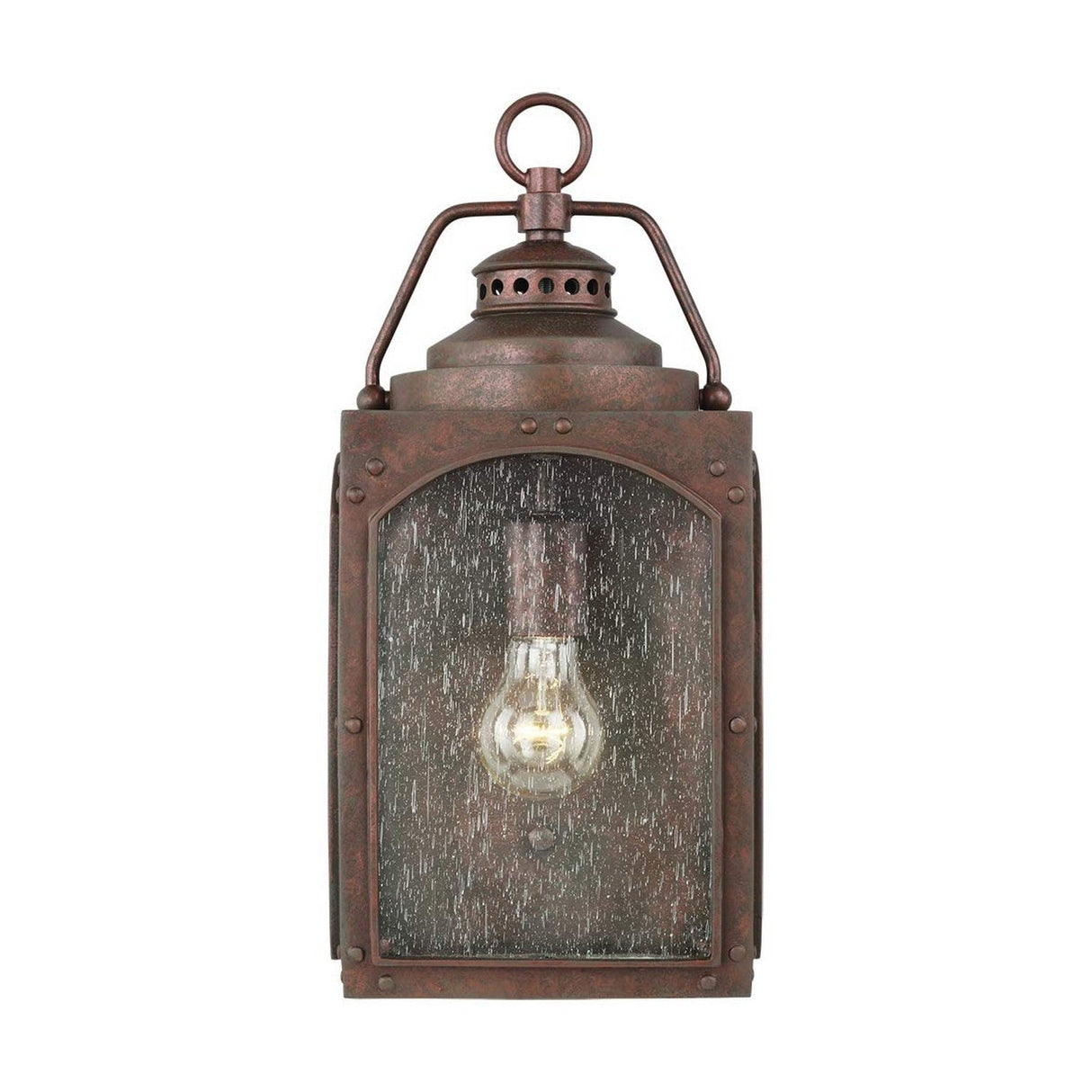 The Randhurst 1 Light Outdoor Medium Wall Lantern, finished in copper oxide, exudes vintage charm with its rustic design and clear glass panel. The single visible bulb inside highlights its classic appeal.