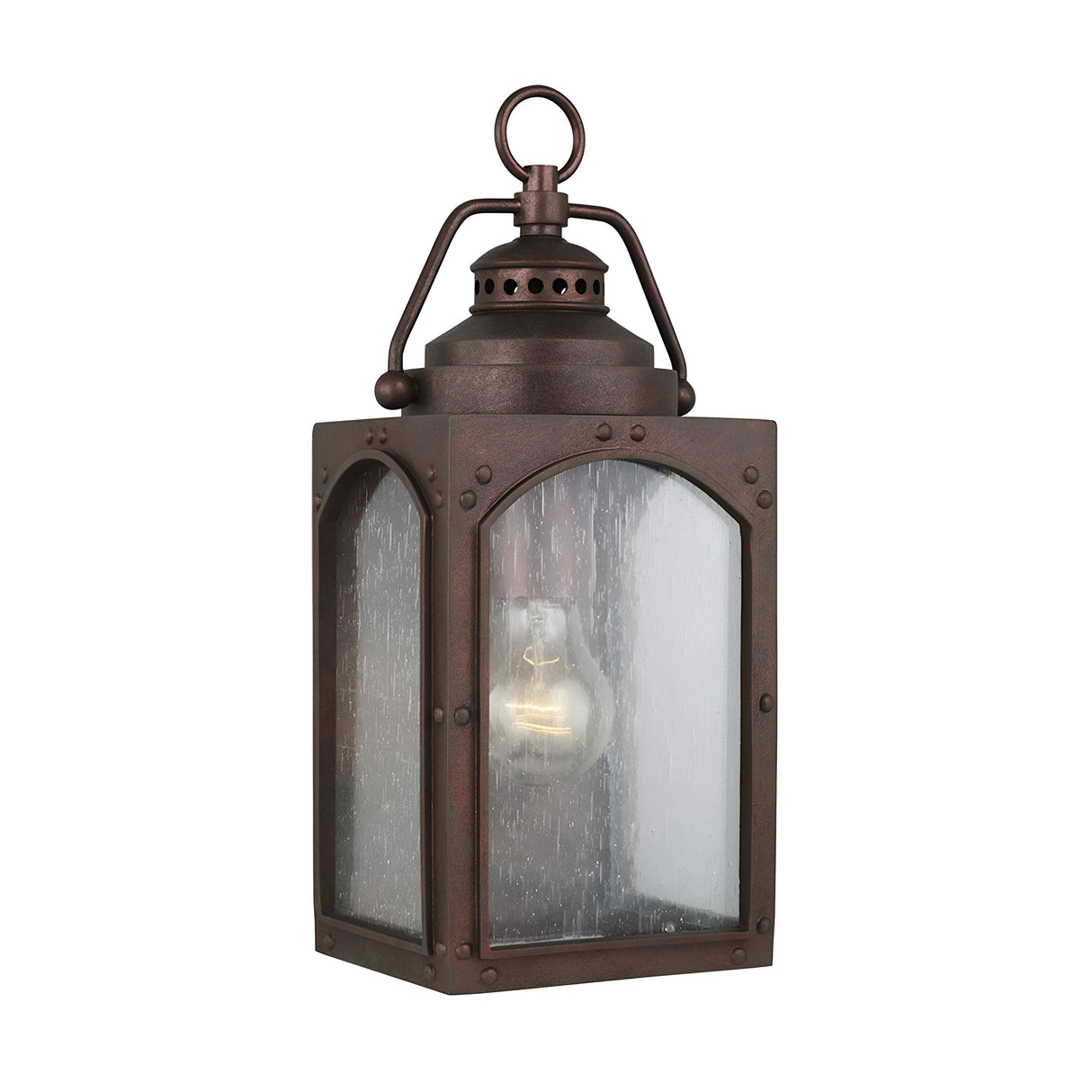 The Randhurst 1 Light Outdoor Small Wall Lantern - Copper features a vintage-style design with a copper oxide finish and glass panels that highlight the visible bulb inside. It includes a top loop for hanging, infusing an antique charm into any setting.