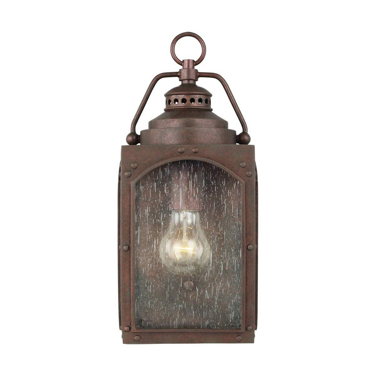 The Randhurst 1 Light Outdoor Small Wall Lantern in Copper features a weathered finish and clear glass front, revealing the bulb inside. Its decorative top handle and durable composite construction add antique flair, while the copper oxide finish enhances its vintage charm.