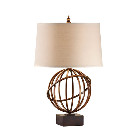 The Spencer 1 Light Table Lamp - Firenze Gold features an original design with a metal globe framework composed of intersecting rings set on a Dark Walnut base. It is finished with a beige fabric lampshade, achieving the ideal blend of contemporary and classic styles.