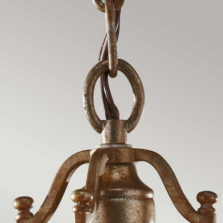 Close-up of the Valentina 1 Light Mini Pendant in oxidized bronze featuring a rustic finish. It has a central column and crystal bobeche accentuating two visible curved arms, with a chain link at the top against a plain background.