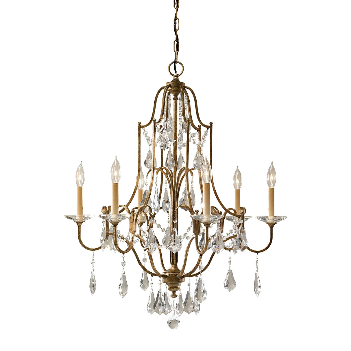 The Valentina 6 Light Chandelier - Oxidized Bronze exudes a vintage charm with its oxidized bronze frame and polished glass crystals. It displays six symmetrically arranged, candle-shaped lights, each fitted with a clear bulb, elegantly hanging from a chain.