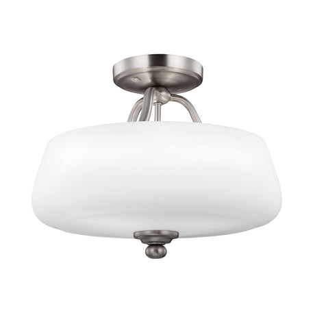 The Vintner 3 Light Semi Flush - Satin Nickel features an opal etched glass shade. This fixture showcases a modern, sleek design with smooth curves and a round base, making it ideal for any contemporary space.