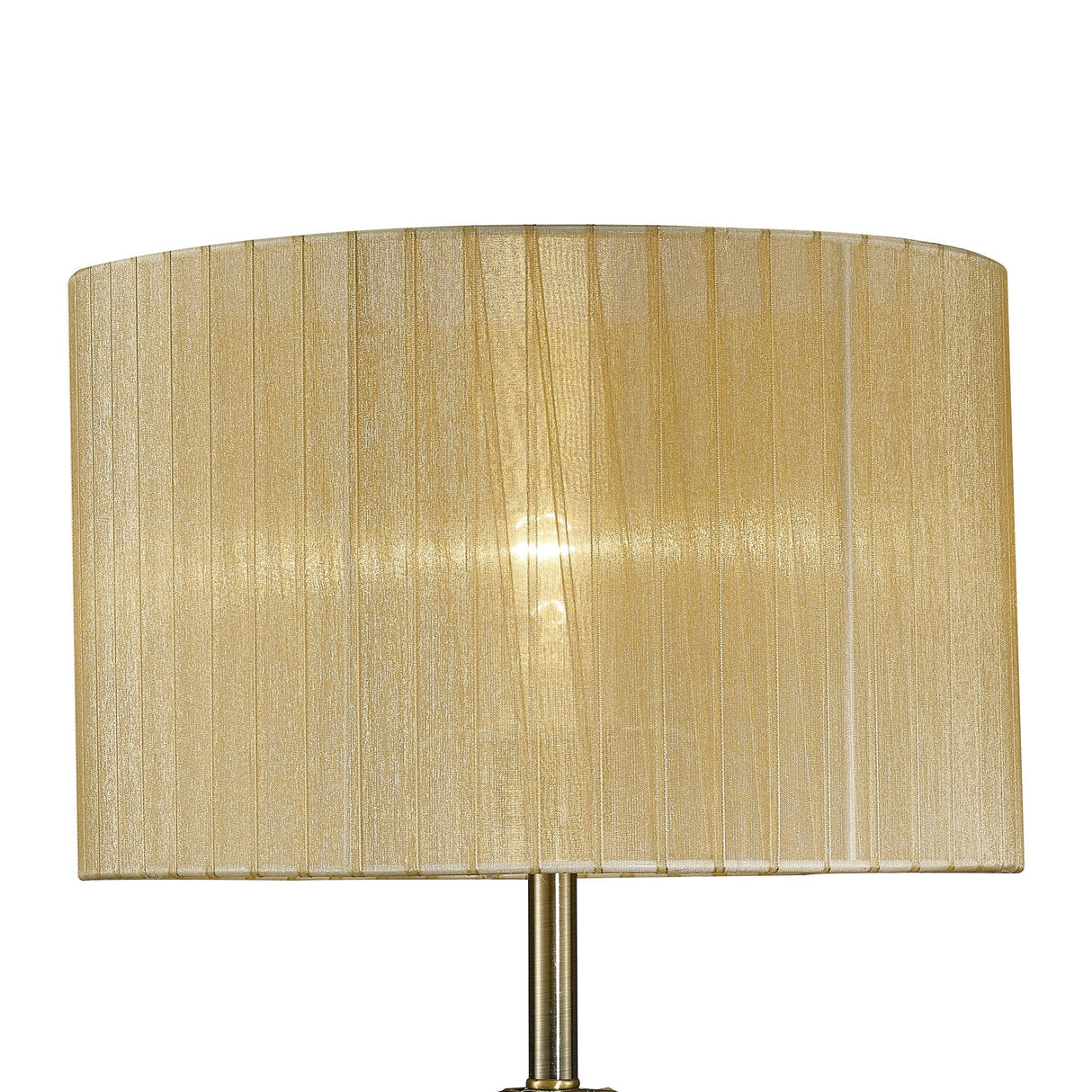 A close-up of the Florence Round 1 Light Crystal Table Lamp shows its cream fabric shade with vertical textured lines softly lit, and the brass base partly visible at the bottom.