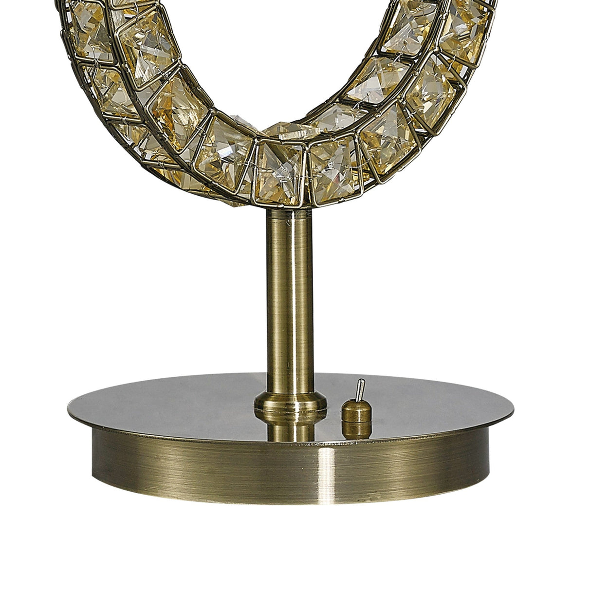 Close-up of the Florence Round 1 Light Crystal Table Lamp, featuring a brass base, circular frame with square faceted crystals, and a small toggle switch. Includes a cream shade for an elegant finish.