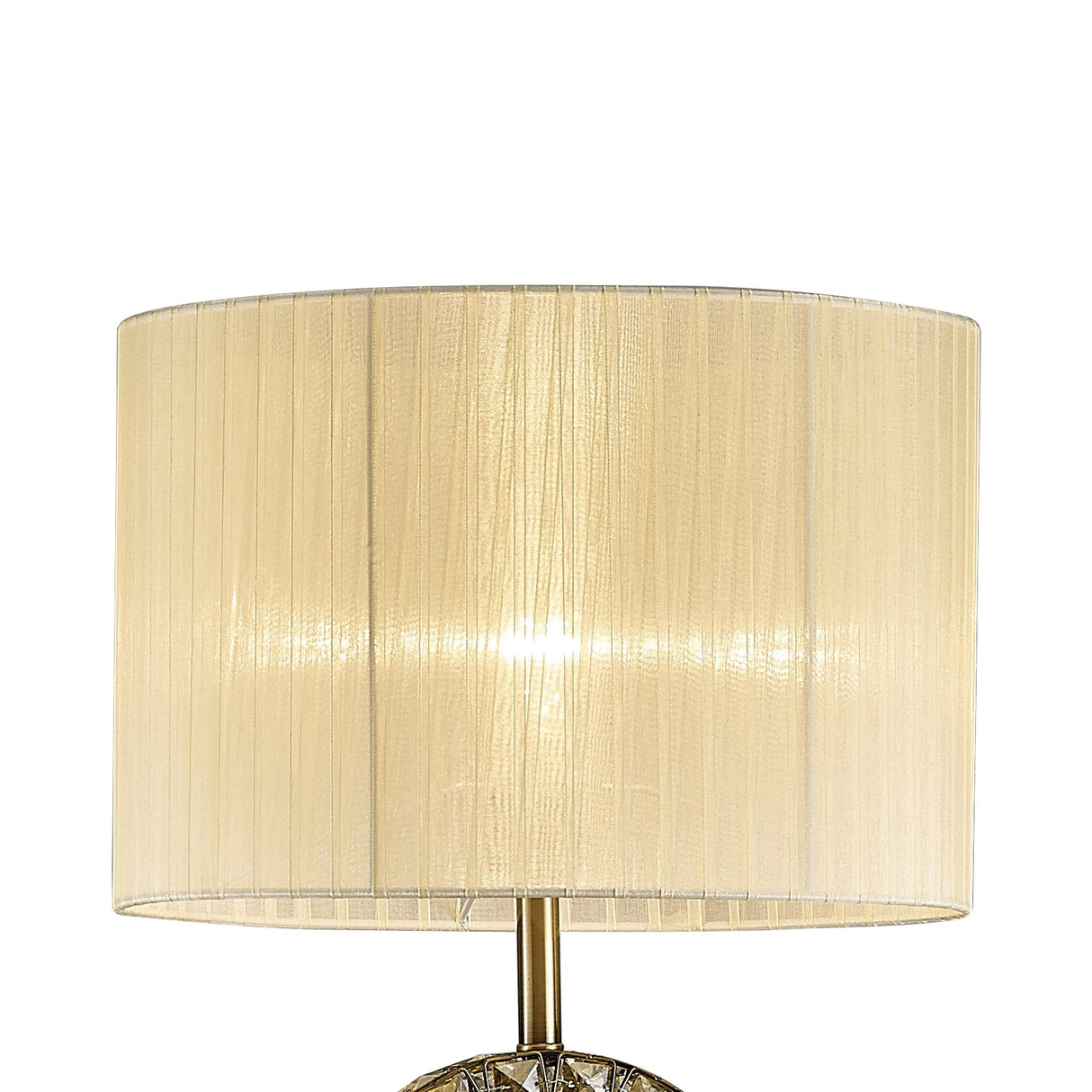 A close-up of the Florence Round 1 Light Crystal Floor Lamp in brass, featuring a cream, pleated cylindrical shade that emits a warm, soft glow.