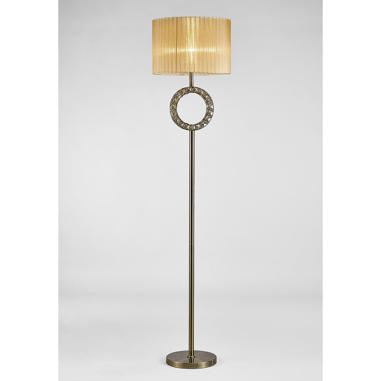 The Florence Round 1 Light Crystal Floor Lamp features a brass base, cream round shade, and a decorative circular ring with crystal accents halfway up the stand. The lamp is tall and dimmable.