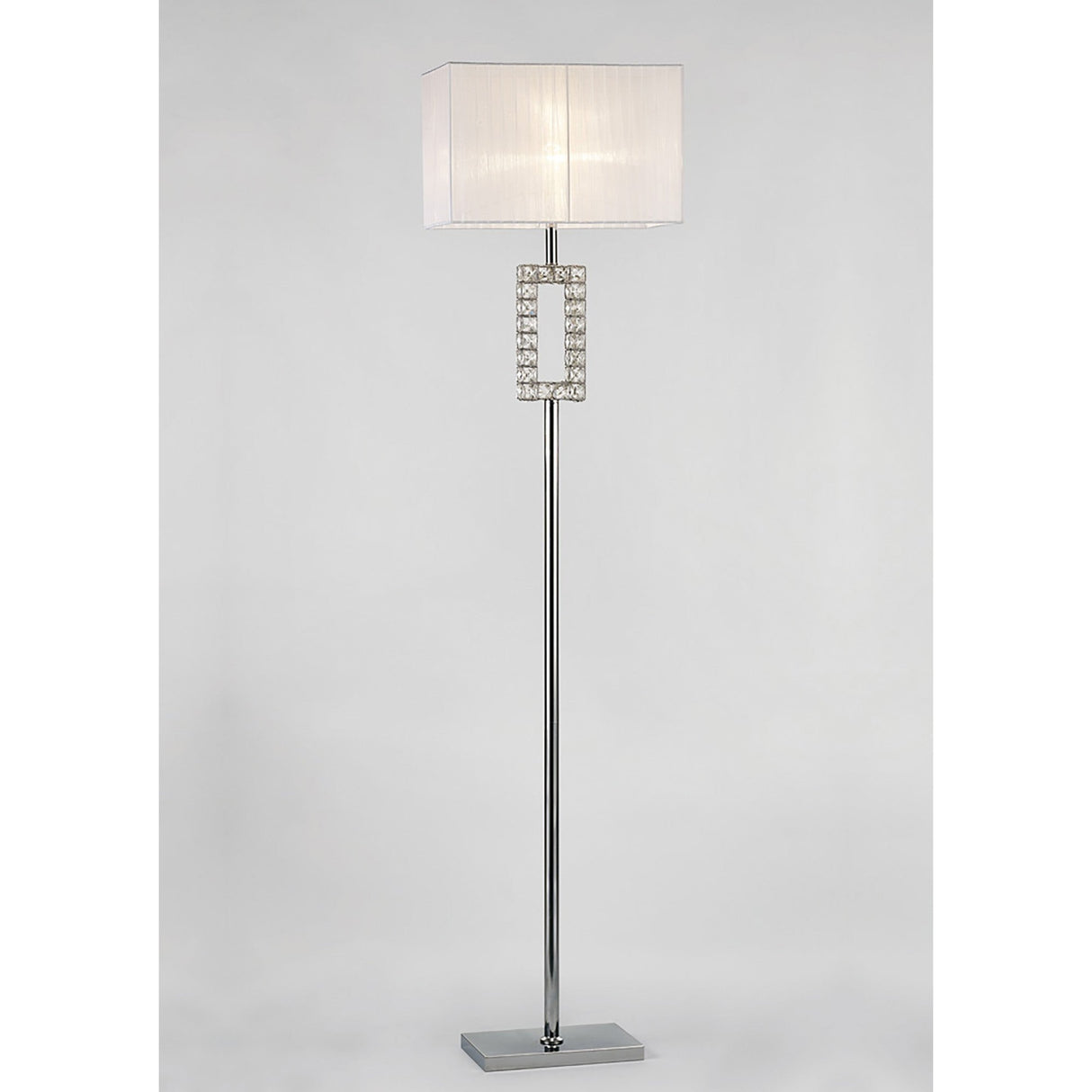 The Florence Rectangle 1 Light Crystal Floor Lamp features a chrome stand, a rectangular white shade, and a crystal accent above its rectangular chrome base.