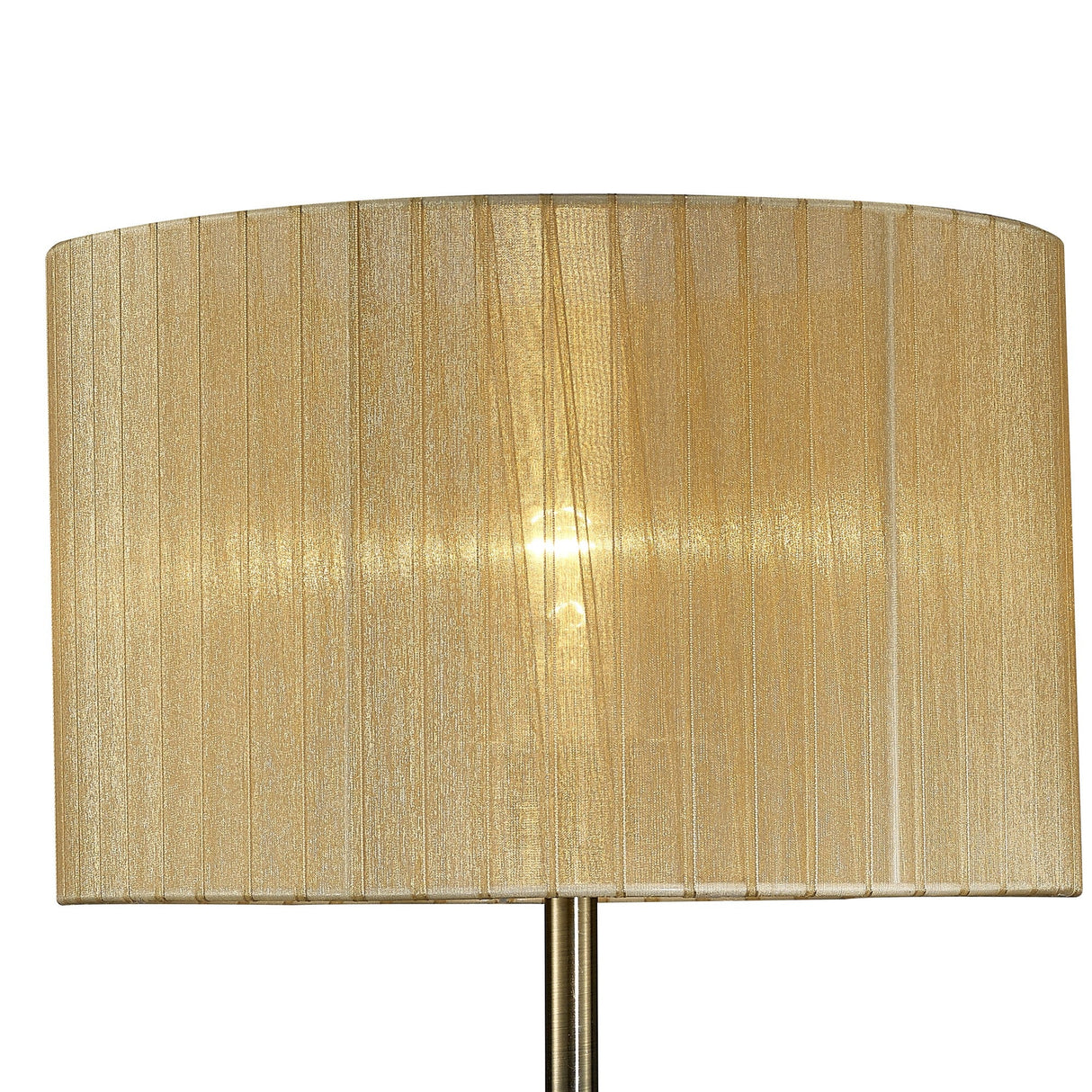 A close-up of the Florence Round 1 Light Crystal Table Lamp in brass, featuring a soft bronze cylindrical fabric shade that gently diffuses light for a warm, inviting glow.