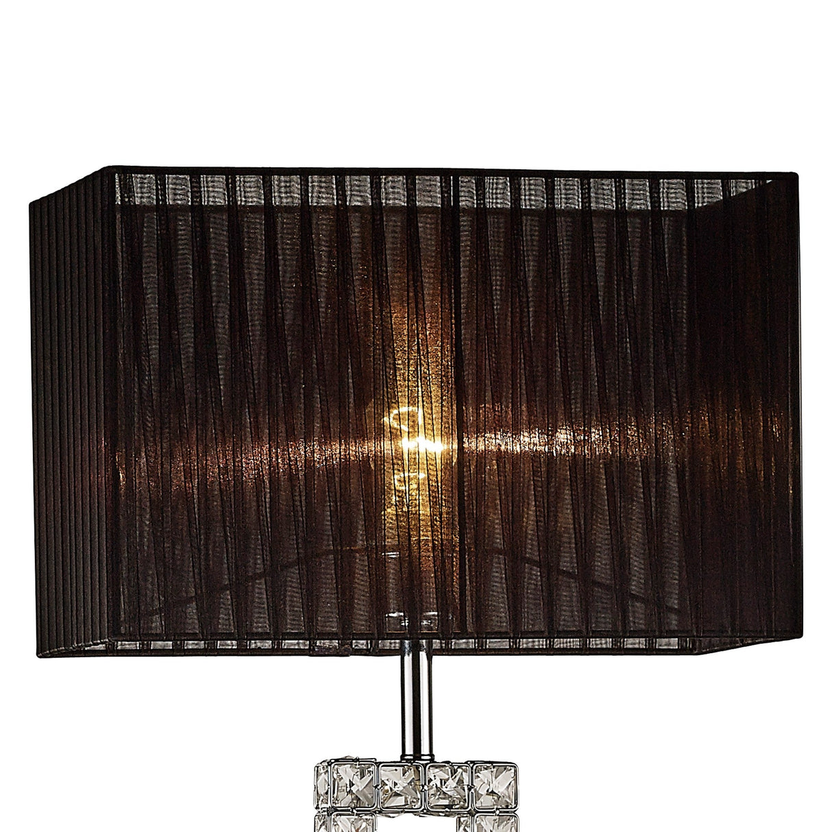 The Florence Rectangle 1 Light Crystal Floor Lamp features a chrome base adorned with clear decorative crystals and a rectangular black mesh shade. The glowing bulb creates a warm ambiance, highlighting the lamp’s modern design.
