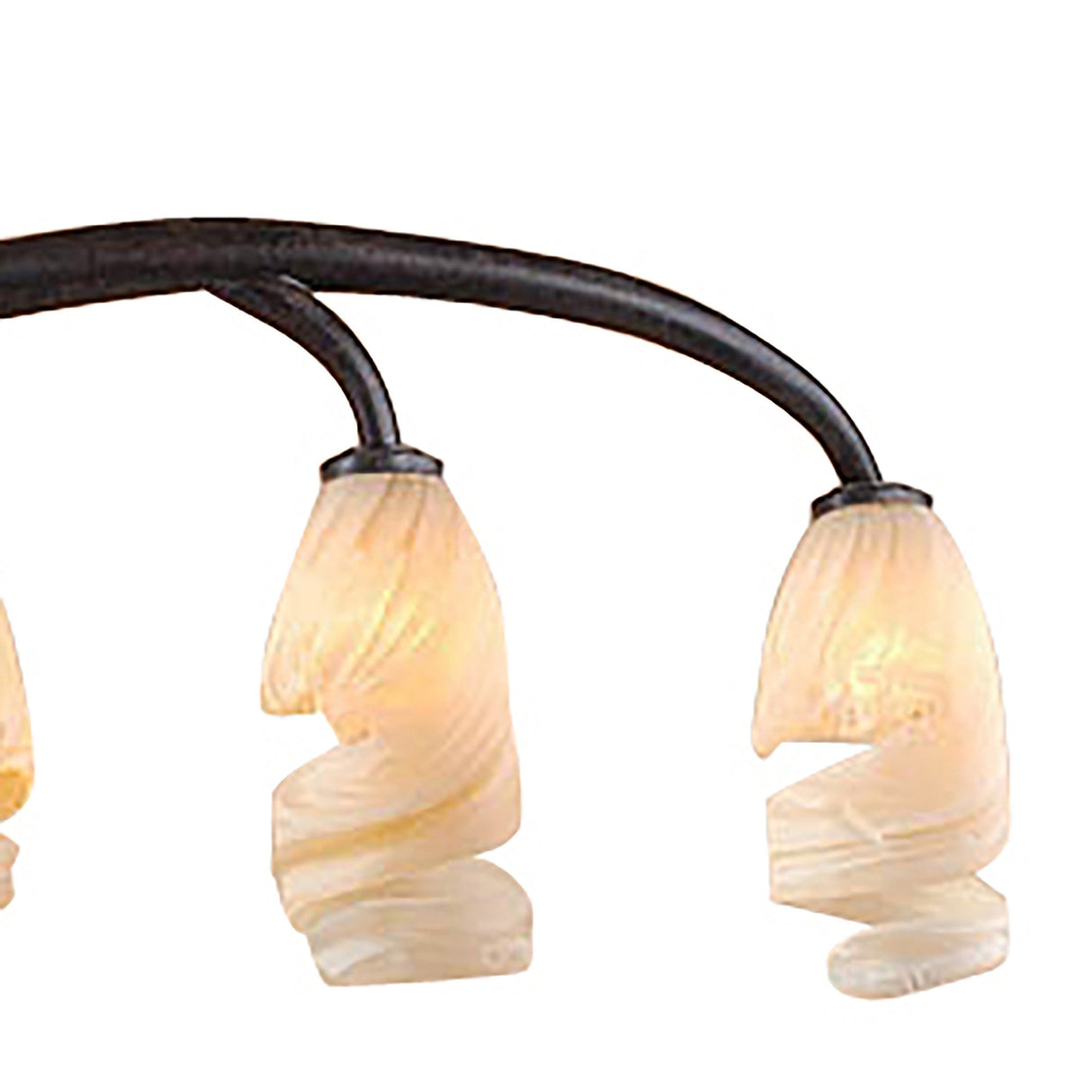 Close-up of Mantra Forest chandelier arms in brown black oxide, with curved stems holding amber frosted spiral-swirl glass shades lit warmly.