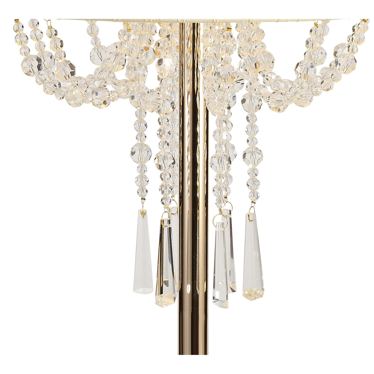 Close-up of the Freida 3 Light Crystal Table Lamp in gold with a cream shade, featuring a gold stem adorned with hanging strands of clear faceted crystal beads and elongated pendants for elegant chandelier-style lighting.