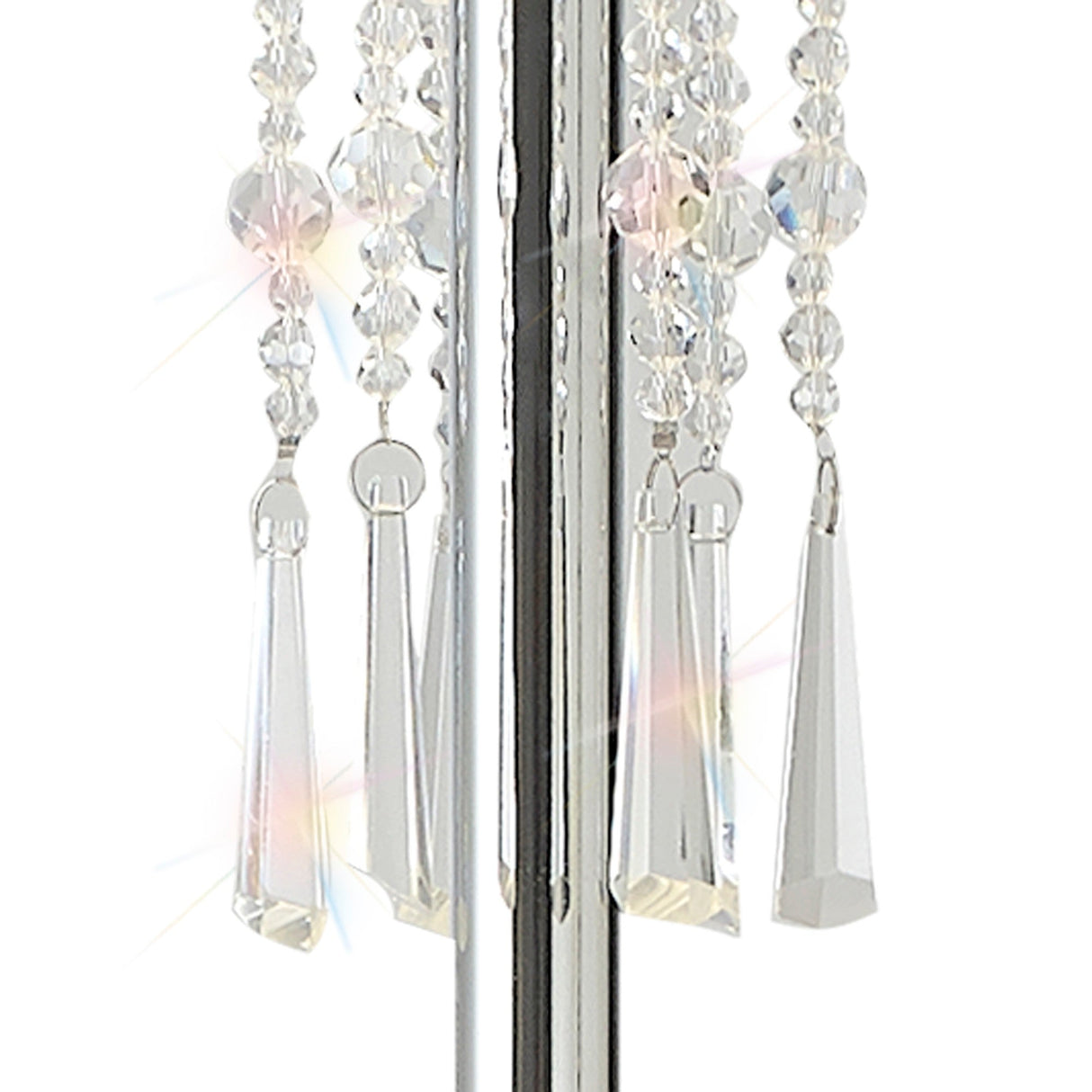 Close-up of clear crystal prisms and beads reflecting light on the Freida 3 Light Crystal Floor Lamp in chrome with a white shade, attached to a shiny metallic rod, subtle rainbow reflections visible on the crystals.