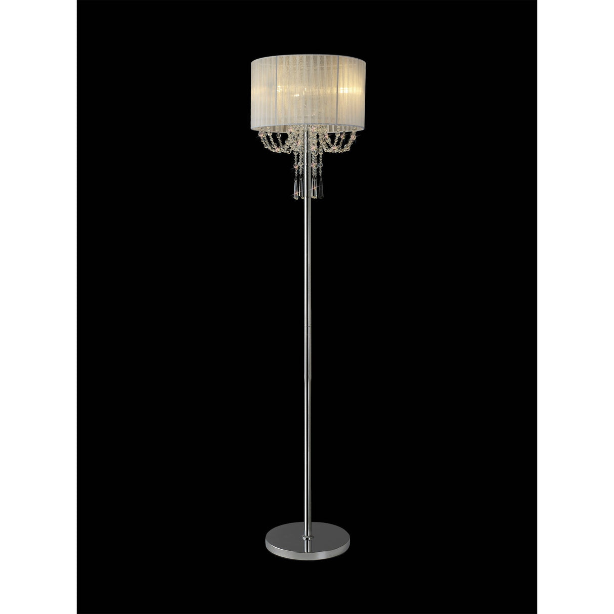The Freida 3 Light Crystal Floor Lamp features a tall chrome stand, a cylindrical white shade, and decorative hanging crystal accents, creating an elegant silhouette against a black background.