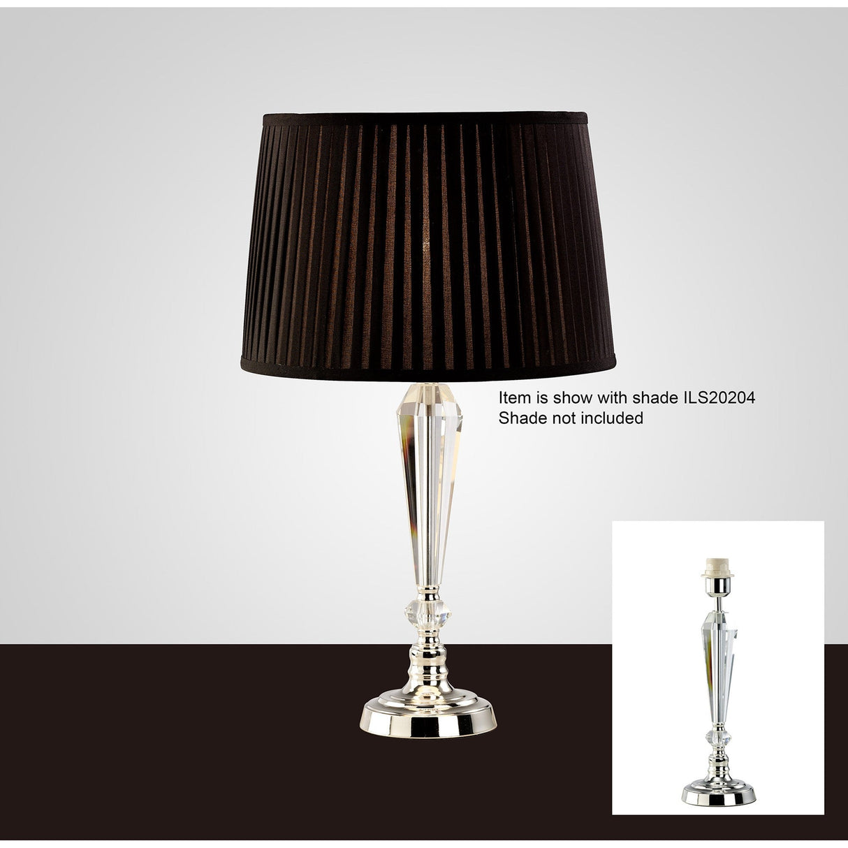 The Freya 1 Light Crystal Table Lamp features a silver base and faceted crystal stem, shown with a pleated black lampshade (not included). Inset displays the lamp without the shade.