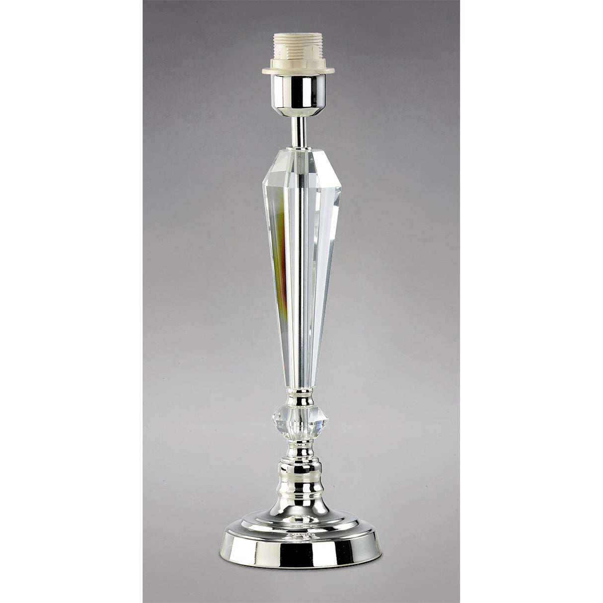 The Freya 1 Light Crystal Table Lamp - Silver Without Shade features a tall, faceted crystal column with shiny silver accents. Displayed without a shade or bulb, it stands elegantly against a plain gray background.