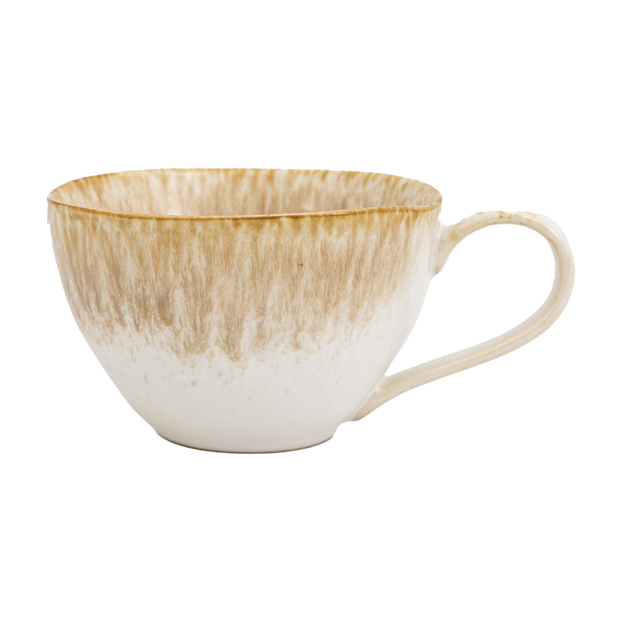 Gallery Direct Reactive Organic ceramic mug in camel, with warm sandy glaze pooling from the rim into a cream base and a curved handle, on a white background.