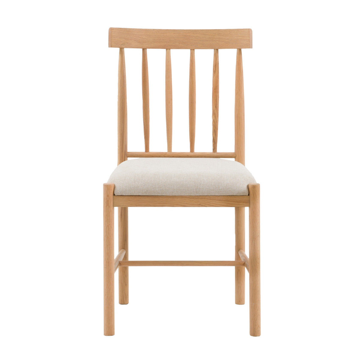 Gallery Direct Etvorne Spindle-Back Dining Chair in natural oak with curved top rail, turned spindles and pale woven fabric seat, on a white background.