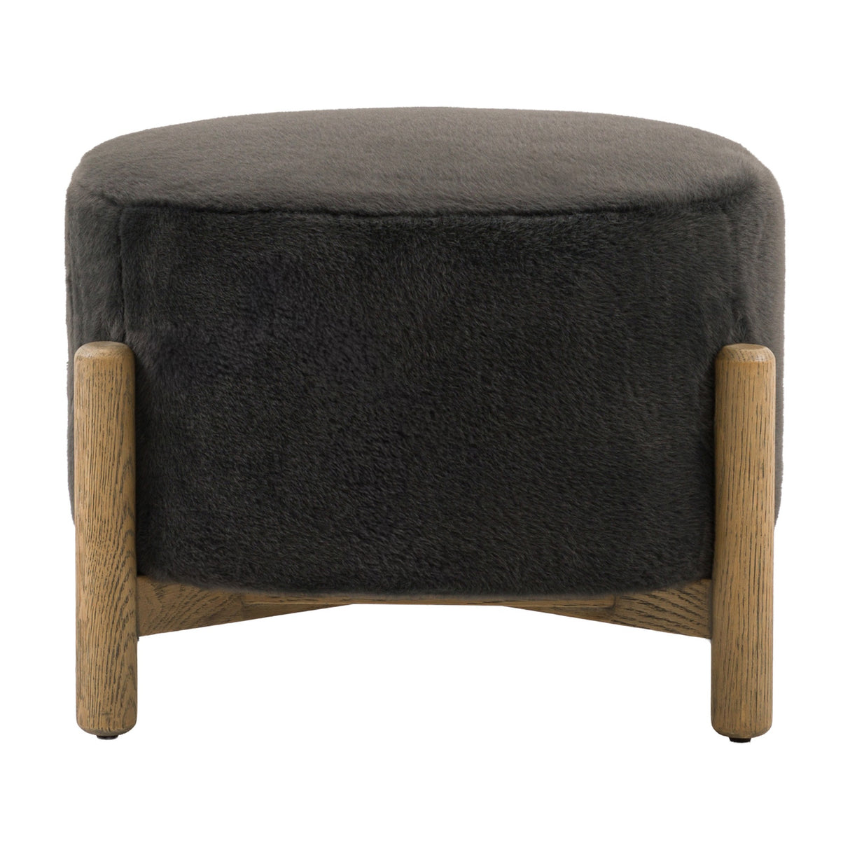 Gallery Direct Tinvane Upholstered Footstool in graphite faux fur with a rounded top and solid oak legs joined by a low cross rail, on a white background.