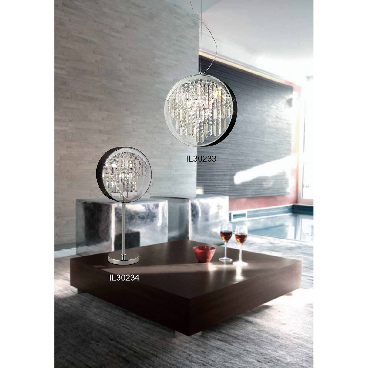 Modern living room with a large wooden coffee table, two glasses of red wine, and striking crystal and metal light fixtures—including the modern statement lamp IL30233 on the ceiling and the Geo Crystal 7 Light Table Lamp - Polished Chrome (IL30234) on the table.