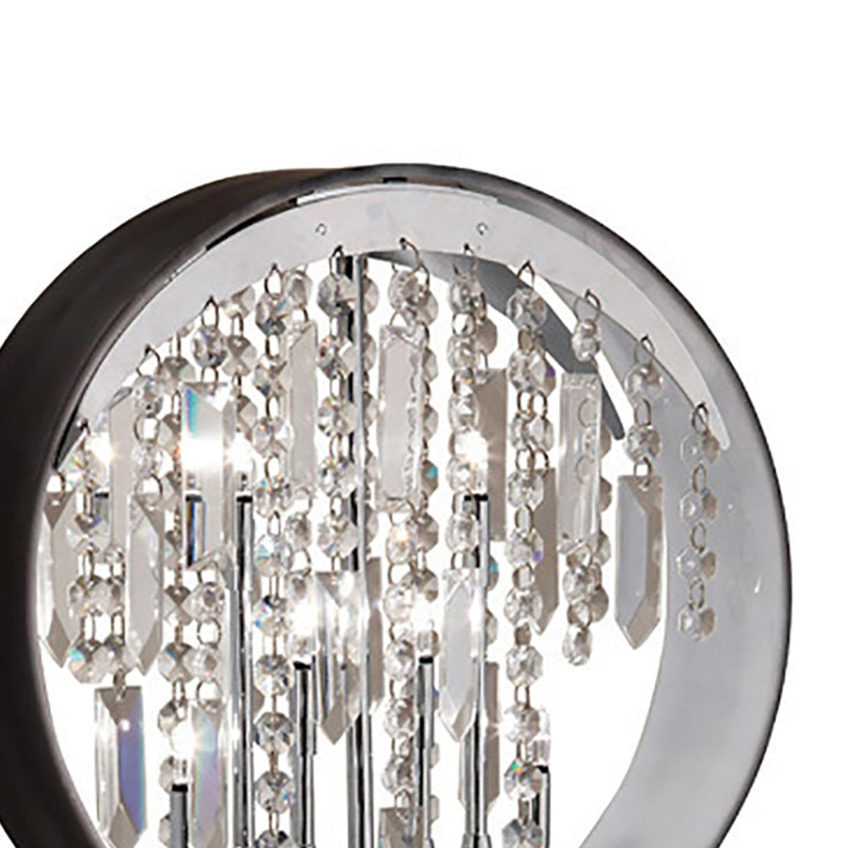 A close-up of the Geo Crystal 7 Light Table Lamp in polished chrome shows rows of hanging crystal prisms and beads within a metallic frame, with the crystals beautifully reflecting and refracting light.
