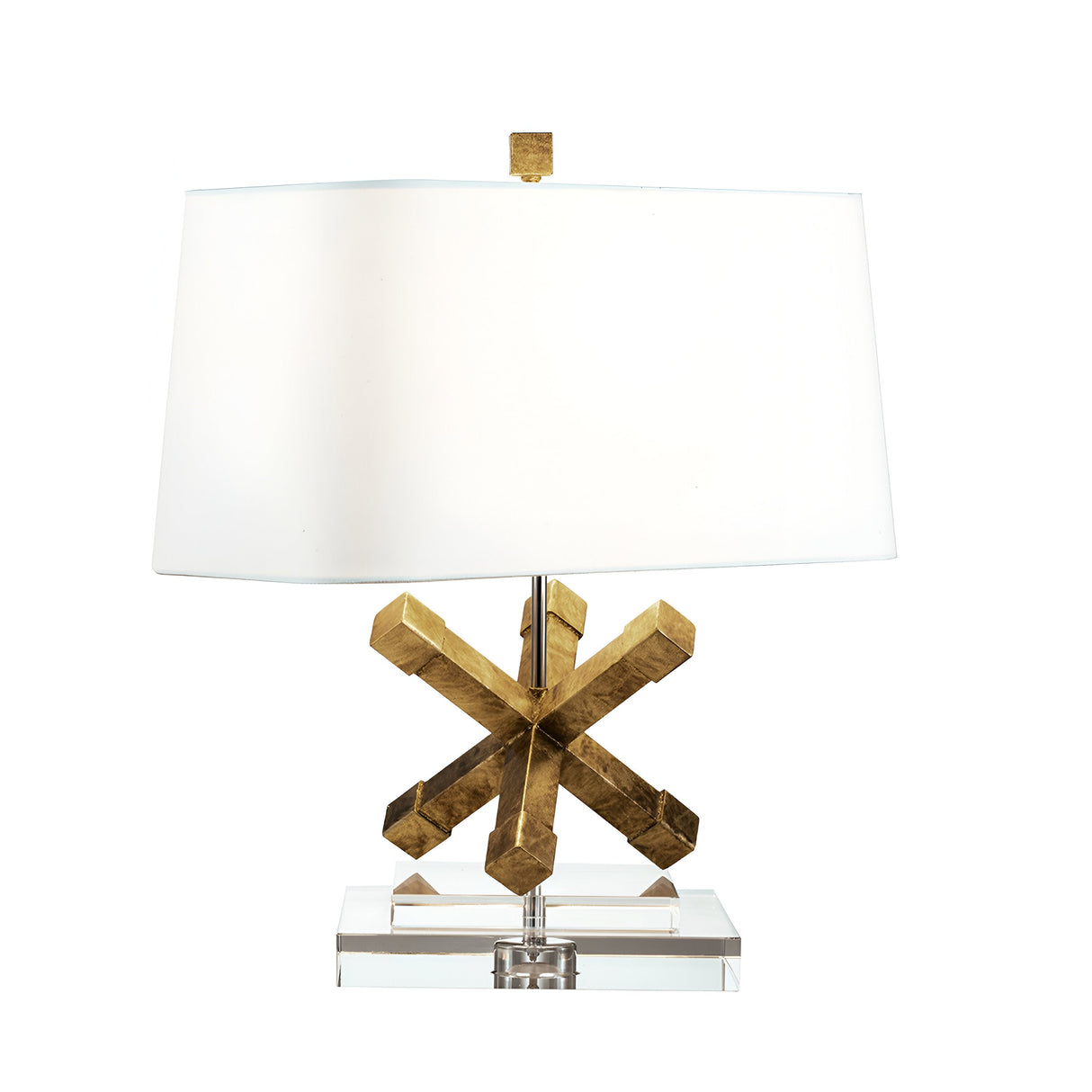 The Jackson Square 1 Light Table Lamp - Gold showcases a cream linen shade paired with a distinctive geometric star base in a striking gold finish. Its base is gracefully set atop a clear, rectangular block, infusing any space with modern sophistication.
