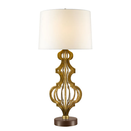 The Octavia 1 Light Table Lamp - Gold With Ivory Shade features an ivory shade resting atop its elaborate gold frame, which is elegantly positioned on a circular dark brown base. The base showcases an intricate design with graceful curves, making it an ideal addition to add sophistication to any room.