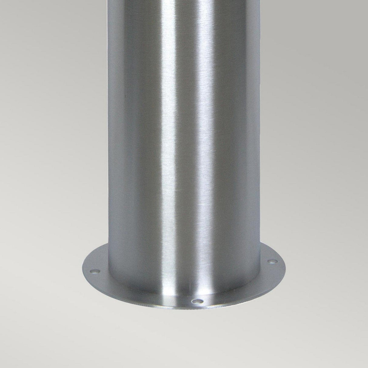 Close-up of the Sandbanks 1 Light Bollard - Silver against a plain background. The bollard features a smooth, shiny stainless steel finish with a round base that includes small holes around the edge, indicating an IP44 rating for enhanced durability in outdoor lighting conditions.