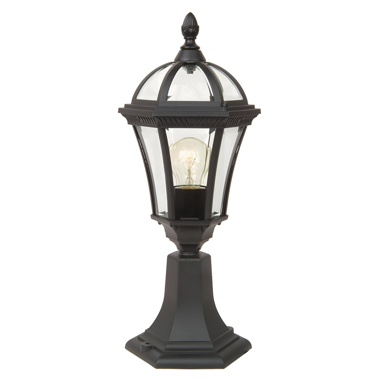 The Ledbury 1 Light Pedestal Lantern - Black is an outdoor fixture meticulously crafted from cast aluminium, showcasing a classic design with decorative exterior lighting. It includes a clear glass enclosure that reveals a visible light bulb inside and is supported by a sturdy base embellished with elegant elements at the top.