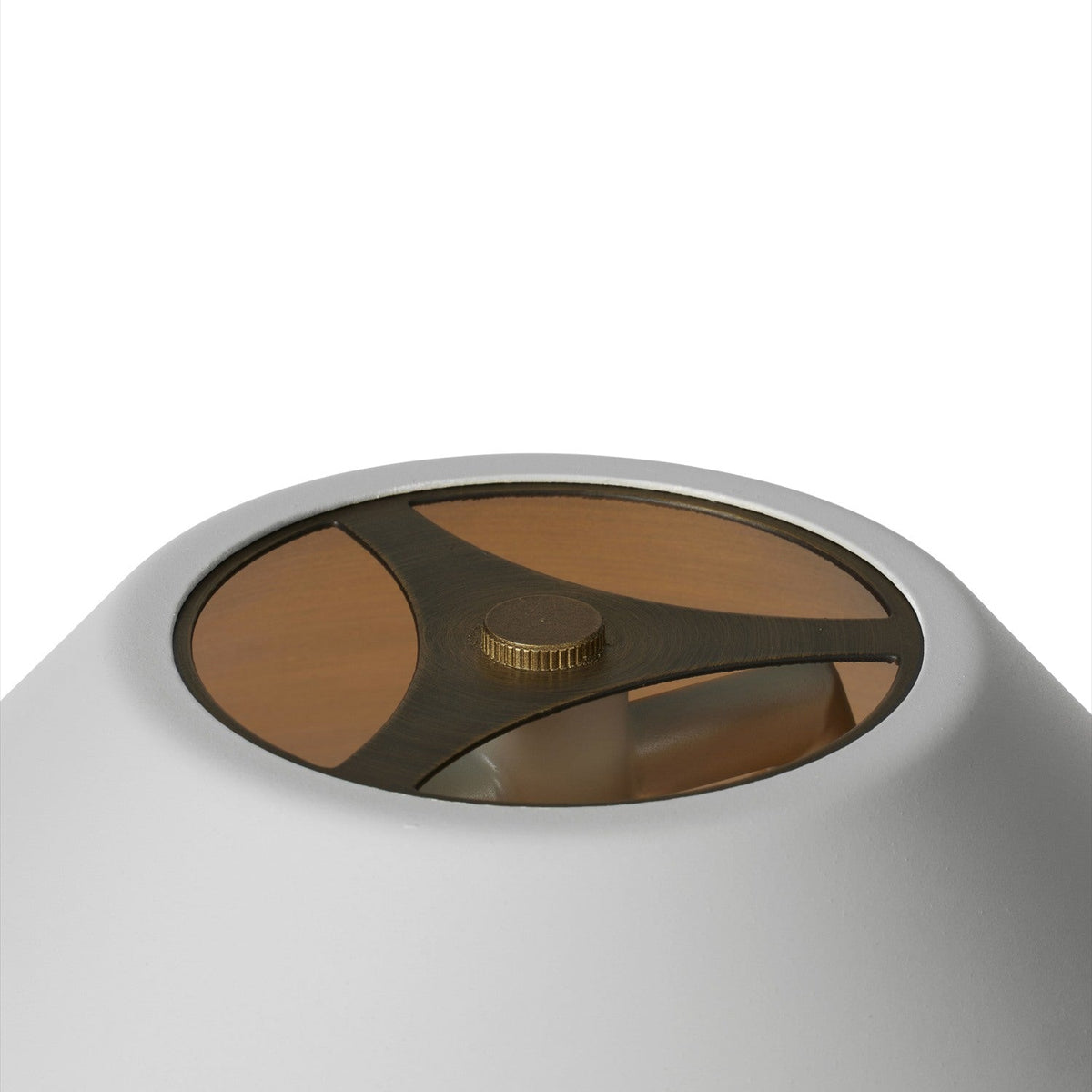 Close-up of the Hygge Floor Lamp's warm grey cone shade with open rim, showing a brushed bronze star-shaped diffuser and brass knob control, set against a plain white background.