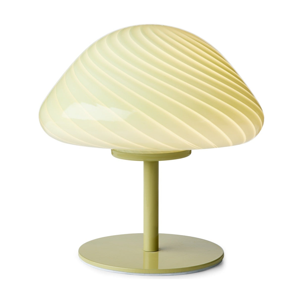Olive green Mini Mush glass table lamp with a low mushroom-shaped dome shade featuring a spiral flute design in warm butter cream tones, on a slender metal stem and round base.