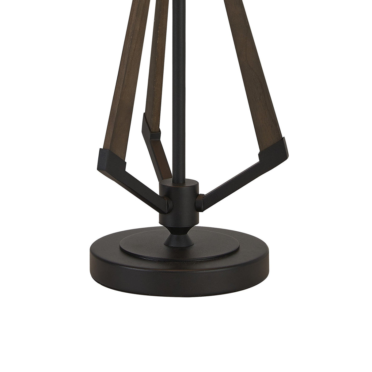 A close-up of the Hilton 1 Light Large Wood Table Lamp in black, featuring three angled dark wooden legs on a round black metal base. The image highlights the lamp’s modern, stylish design and craftsmanship.