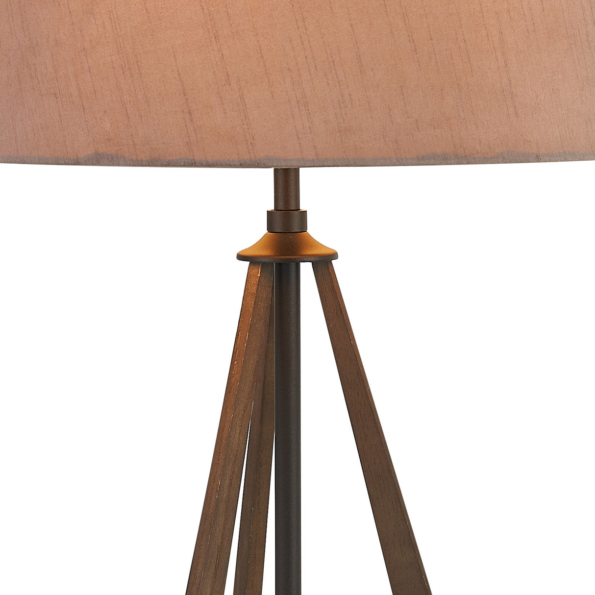 A close-up of the Hilton 1 Light Wood Table Lamp, featuring a black tripod base and a gold lampshade, set against a white background.